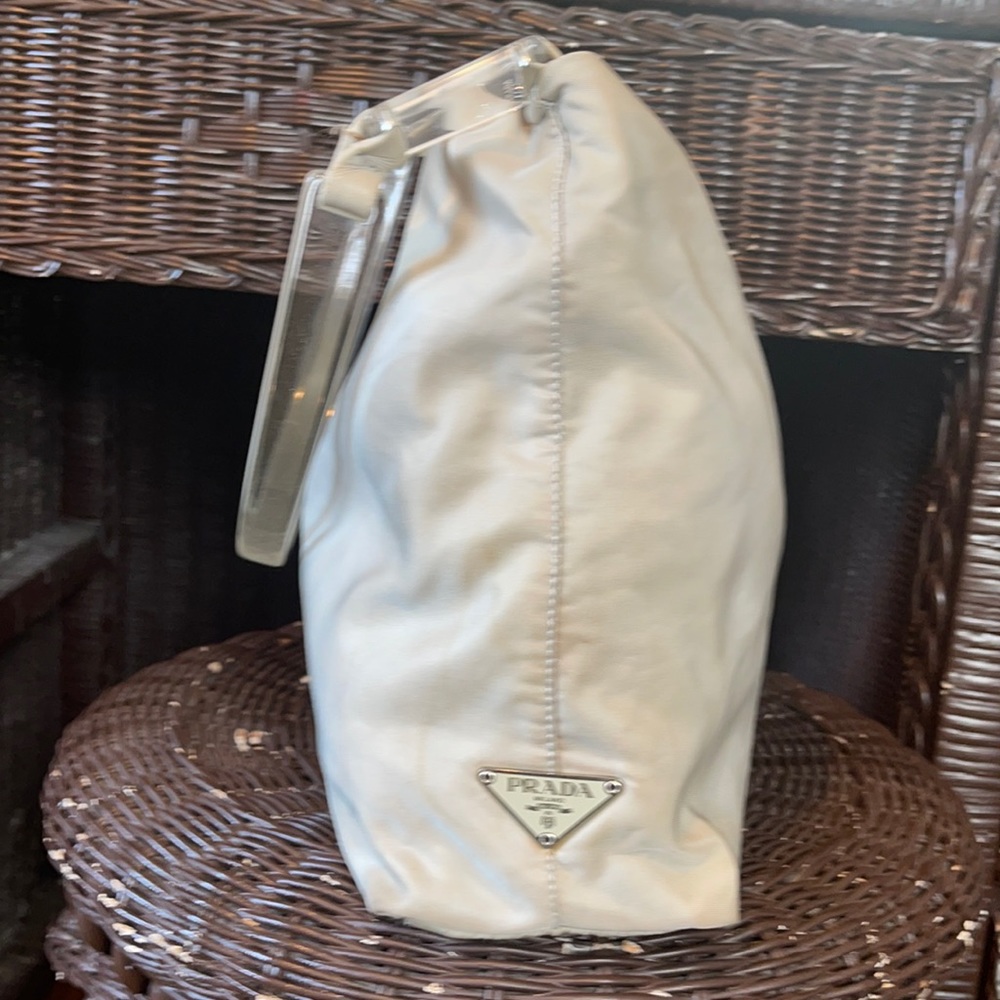 Prada bag light grey.  Lucite handle.
